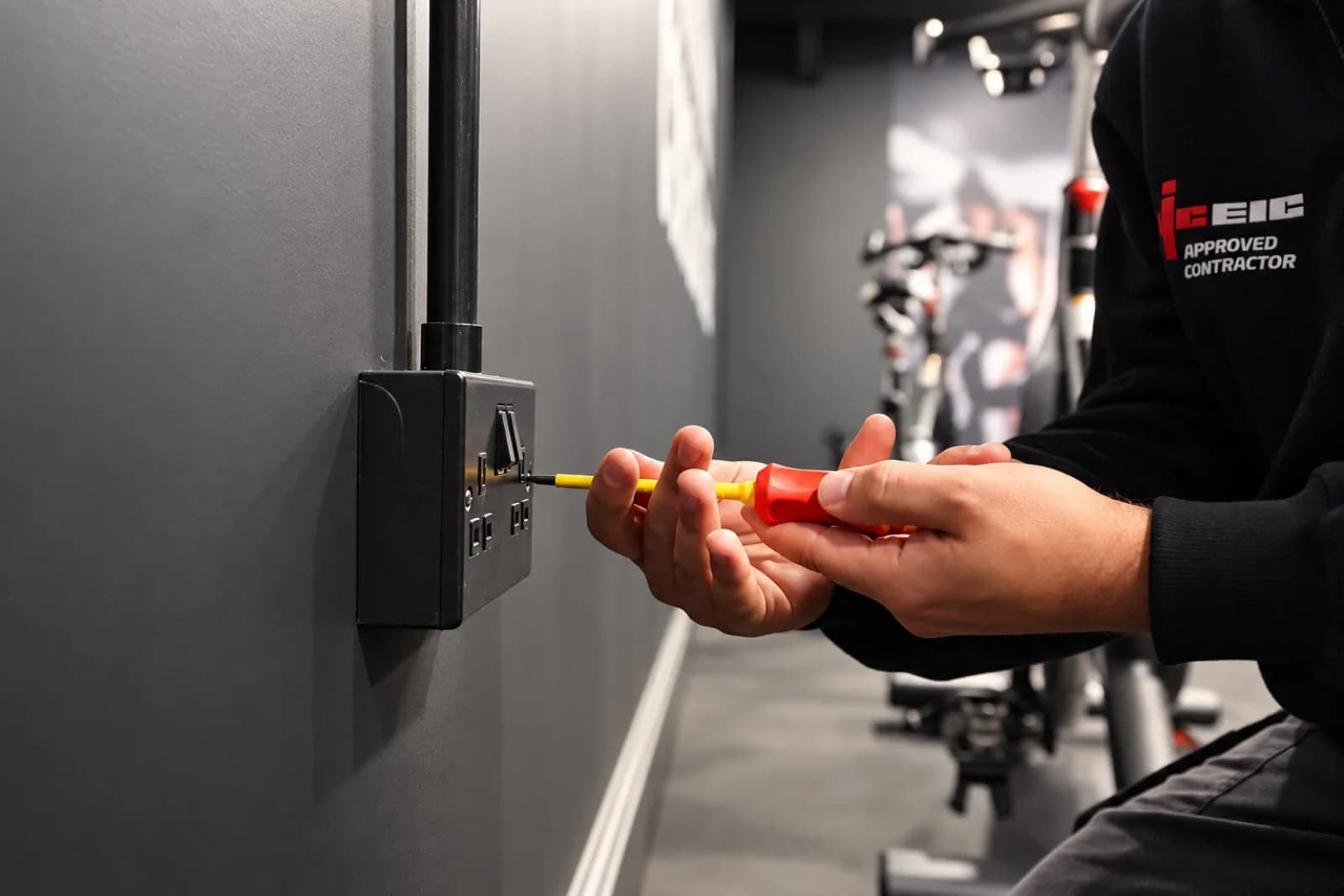 Fitting a socket in a gym fit out