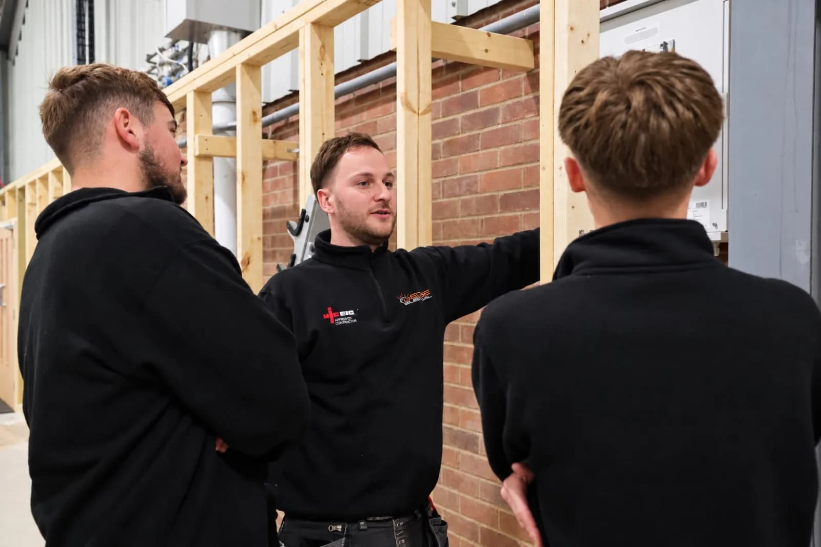 Talking through a distribution board with two of the team